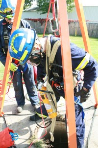 Rescuer entering a Confined Space on a Tripod